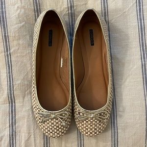 Gold and cream flats